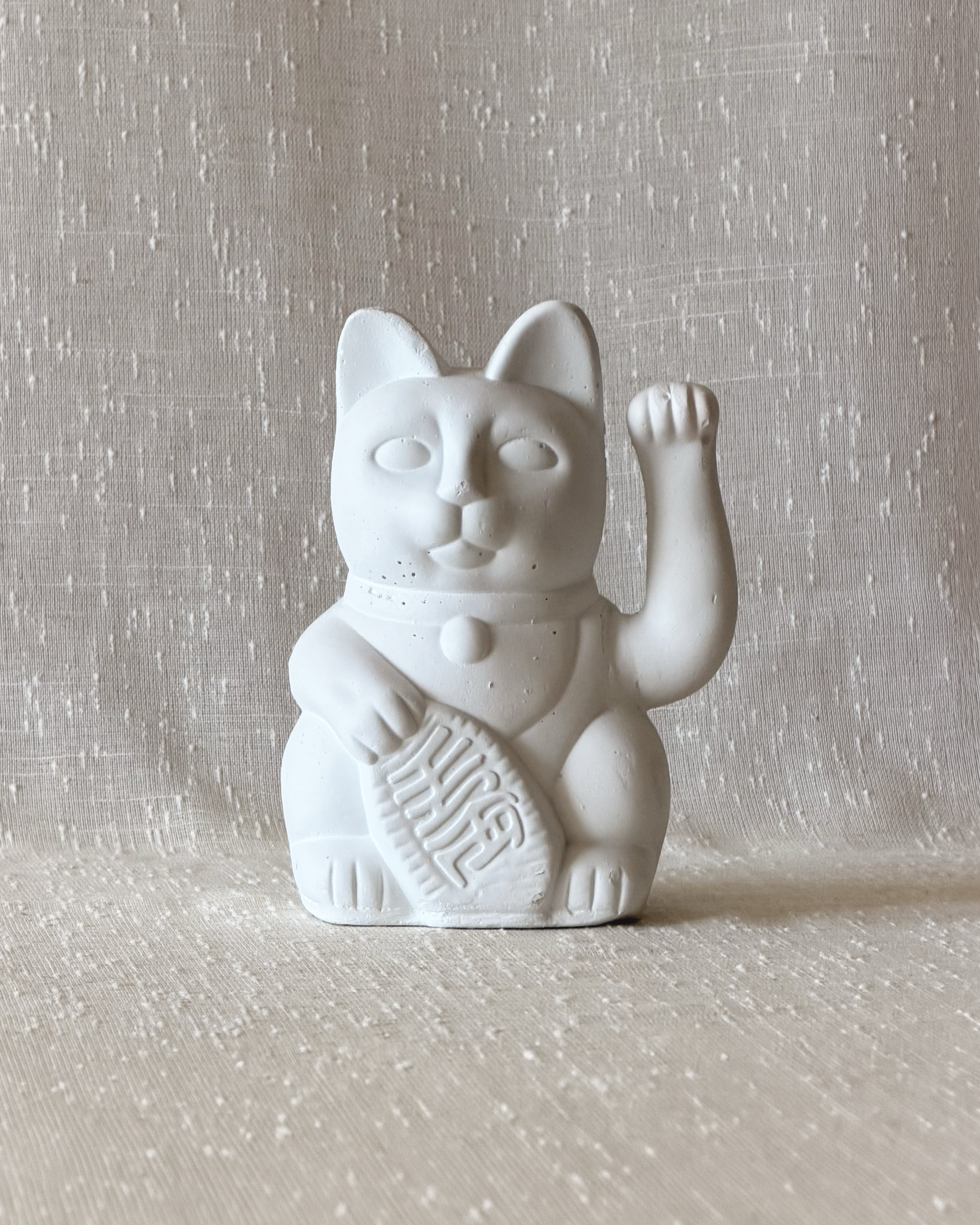 gato de piedra porta vela